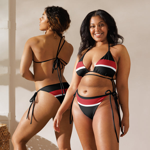 Two models wear the Tricolored Blackbird recycled string bikini