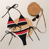 Front view of the Tricolored Blackbird recycled string bikini next to sunglasses